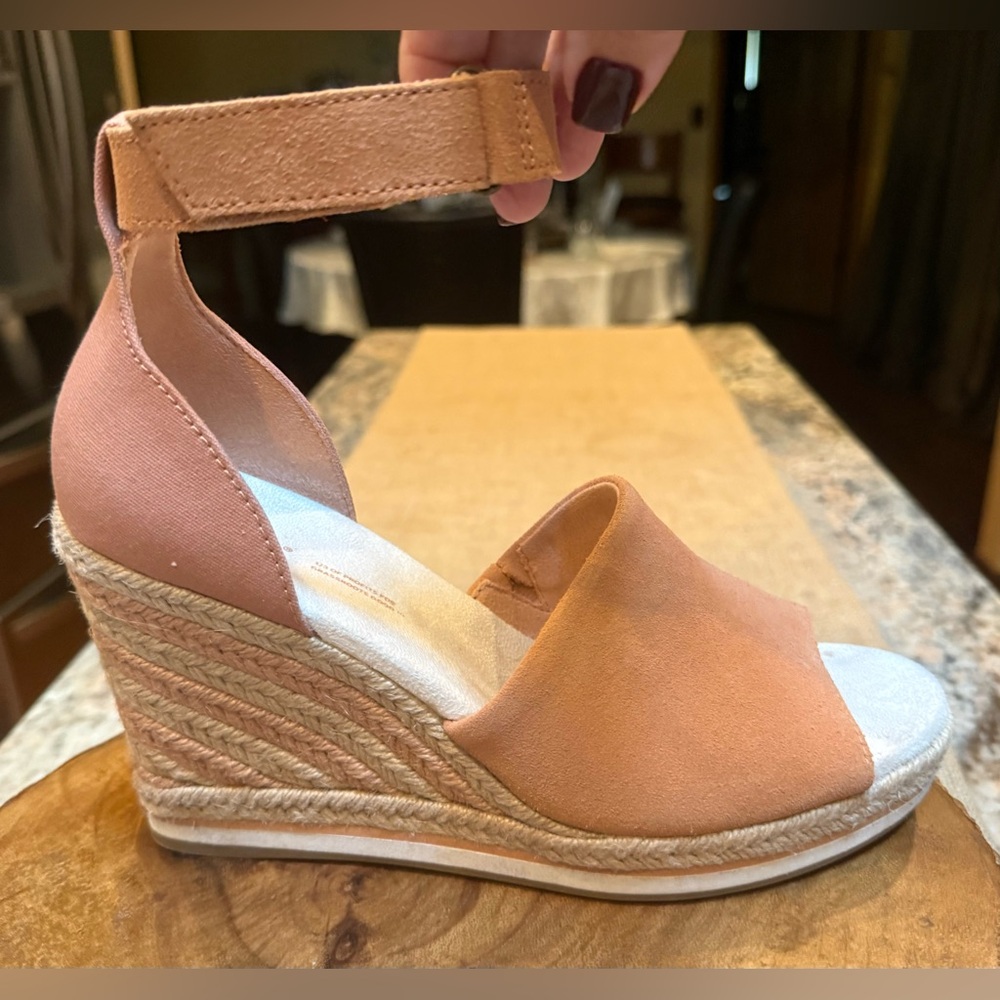 Toms peach/pink colored espadrille wedges with adjustable Velcro strap. EUC